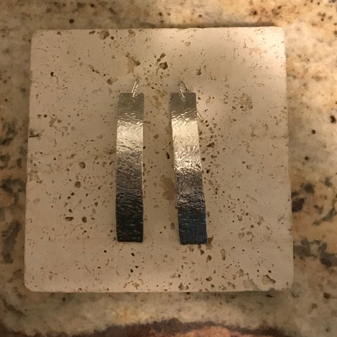 Hammered geometric earring image 0