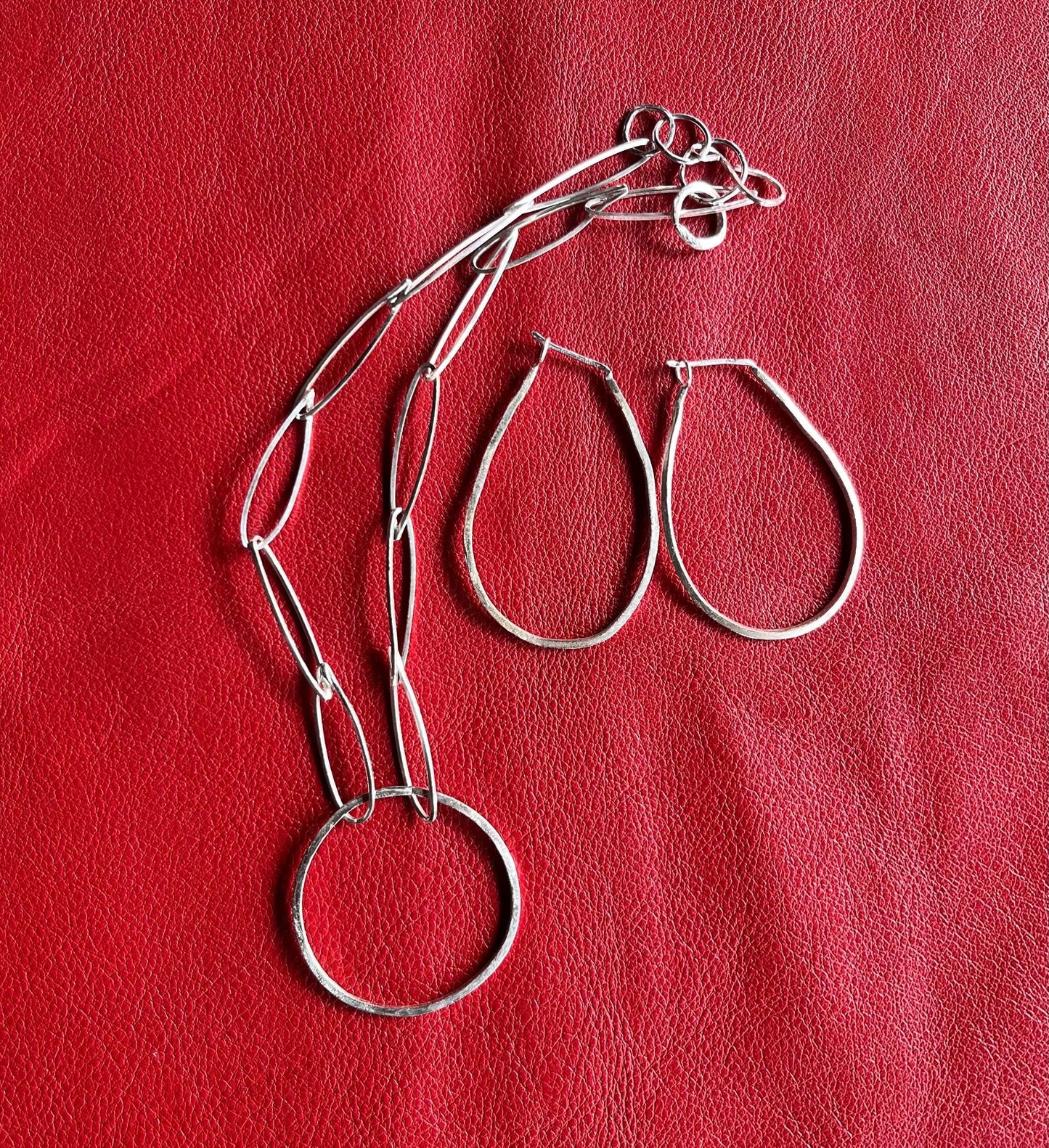 Circular pendant earring set