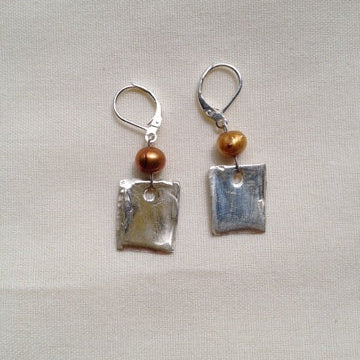 Silver and bronze earring image 0