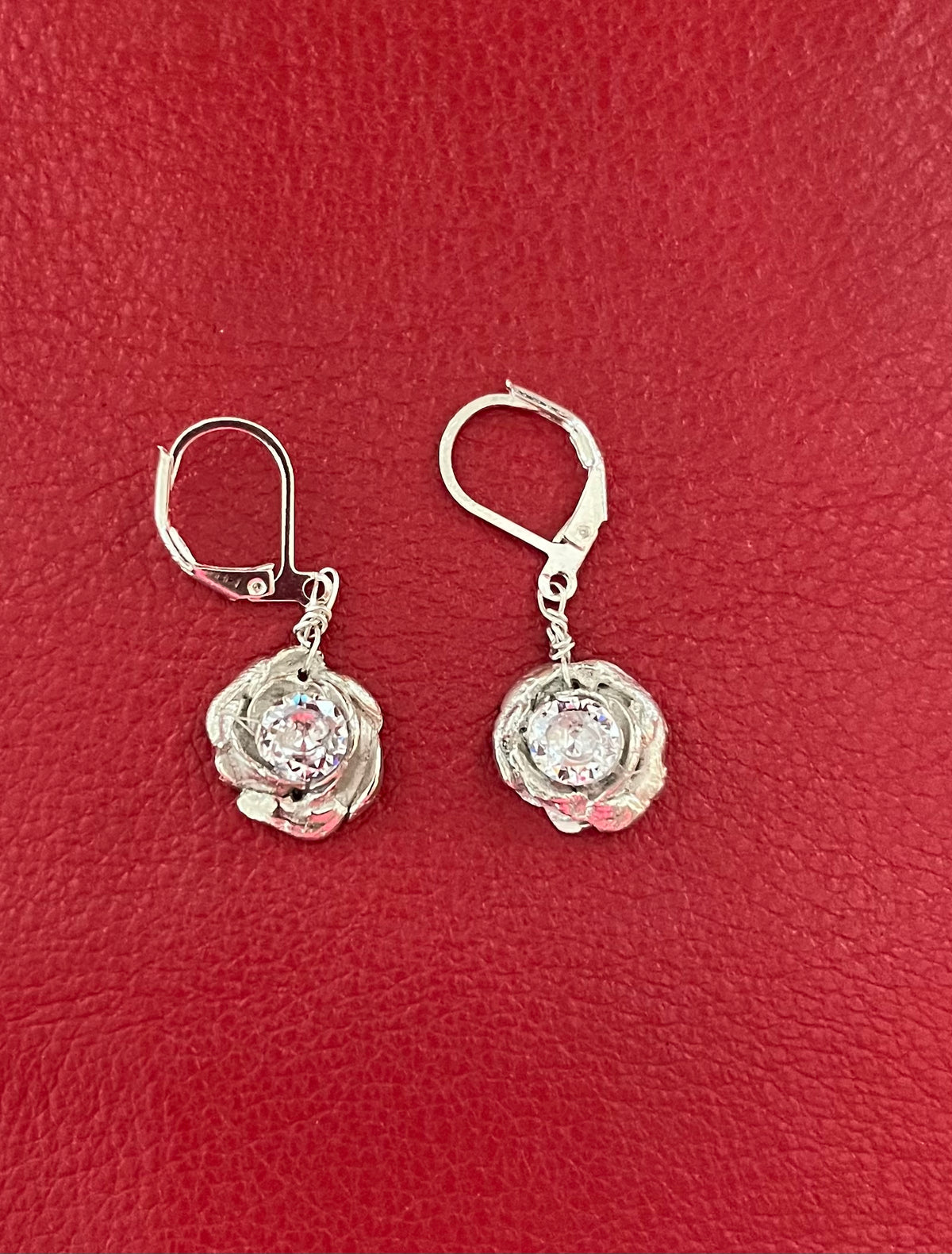 Silver rose and diamond earrings