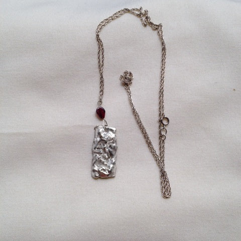 Silver and garnet necklace image 0